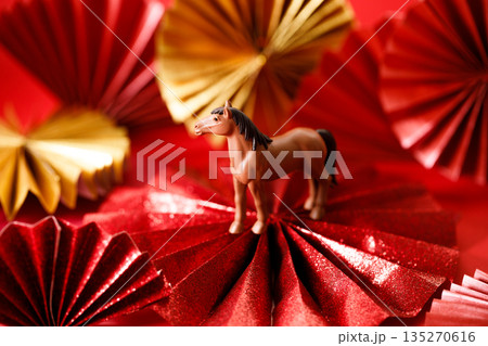 A festive Chinese New Year background with red paper fans. A festive Chinese New Year background with red paper fans. 135270616