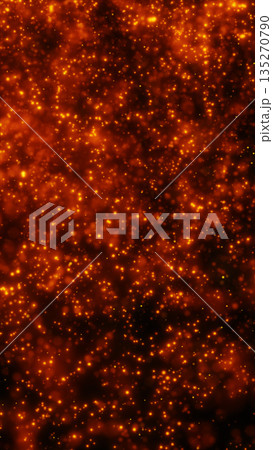 Warm orange glitter particles and glowing sparks floating in dark space, festive bokeh abstract background 135270790