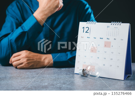 Job search light bulb hire career college recruitment business contemporary opportunity concept, creative employment recruiting person sits by desk calendar planning future Job search light bulb hire career college recruitment business contemporary opportunity concept, creative employment recruiting person sits by desk calendar planning future 135276466