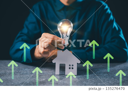 Real estate innovation using house light bulb energy home knowledge provides mortgage property electricity savings, creative lightbulb idea shows green growth for smart investors Real estate innovation using house light bulb energy home knowledge provides mortgage property electricity savings, creative lightbulb idea shows green growth for smart investors 135276470