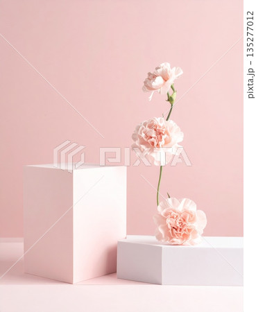 A beautiful bouquet of blooming pink flowers and spring cherry blossoms arranged in a glass vase captures the essence of nature and floral beauty 135277012