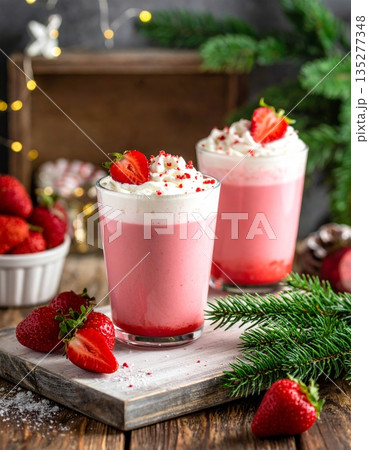 A fresh pink strawberry milkshake in a glass topped with whipped cream and a red berry garnish makes a sweet cold fruit beverage or healthy yogurt smoothie dessert isolated on white A fresh pink strawberry milkshake in a glass topped with whipped cream and a red berry garnish makes a sweet cold fruit beverage or healthy yogurt smoothie dessert isolated on white 135277348