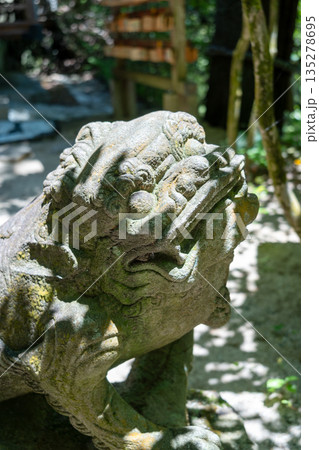 Stone komainu statue at Mitaki-Dera temple in Hiroshima, Japan 135278695