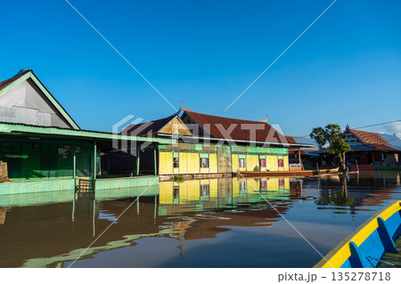 Traditional Bugis floating houses on Lake Tempe, Sulawesi, Indonesia 135278718