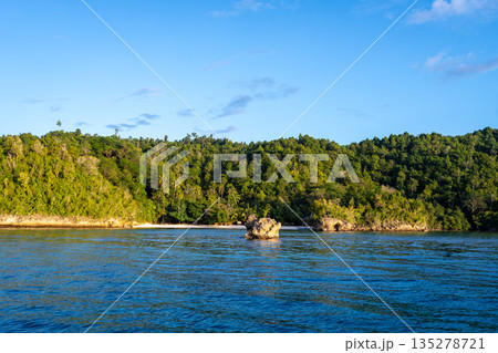 Lia beach at sunset, Waleakodi Island, Togian archipelago, Sulawesi, Indonesia 135278721
