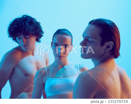Three young adults frontal portrait expressing confidence and power. Three young adults frontal portrait expressing confidence and power. 135278729