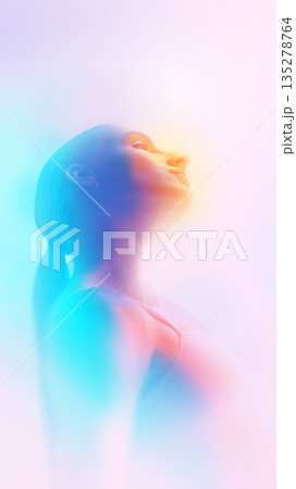 Ethereal female profile looking up in abstract pastel haze. Ethereal female profile looking up in abstract pastel haze. 135278764