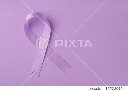 Lilac ribbon on purple background. Lilac ribbon on purple background. 135280134