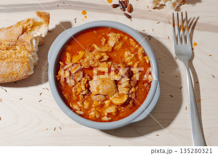 a bowl of traditional Spanish callos stew 135280321