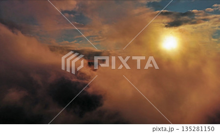 Aerial view of orange fluffy cloud in sky 135281150