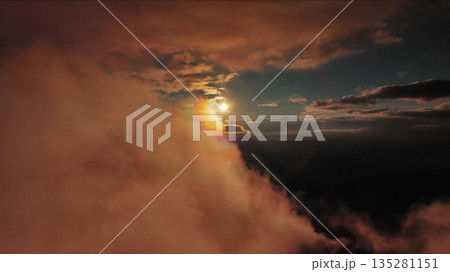 Aerial view of orange fluffy cloud in sky Aerial view of orange fluffy cloud in sky 135281151