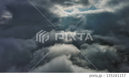 Aerial high view of dramatic clouds and sun 135281157