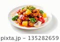 Closeup of Crispy Sweet and Sour Pork Served on White Plate with Colorful Bell Peppers and Pineapple, Traditional Asian Cuisine 135282659