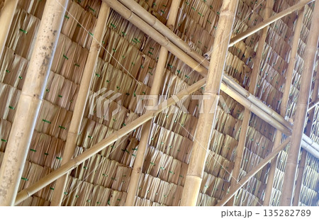 Wooden Roof with Natural Grass Thatch Simple Design 135282789