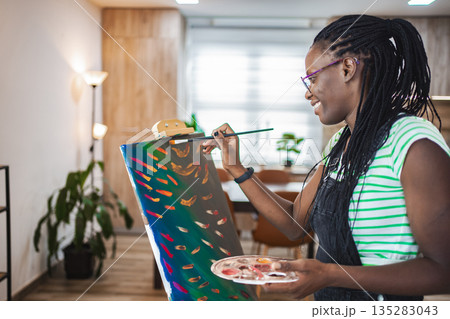 Vibrant artistry in a cozy studio on a sunny afternoon 135283043