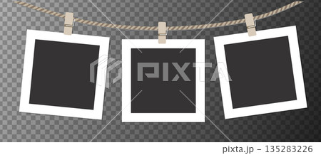 Realistic retro set photo frames hanging on rope. 135283226
