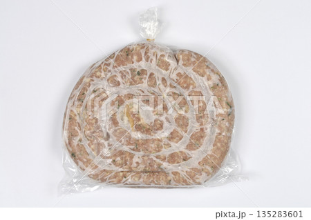 Frozen Spiral Homemade Sausage in Plastic Bag 135283601