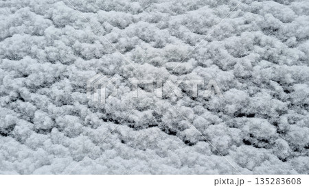 Snow Texture on Dark Surface 135283608