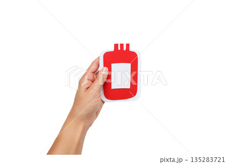 Hand holding a red blood bag model for donation, isolated, PNG Hand holding a red blood bag model for donation, isolated, PNG 135283721