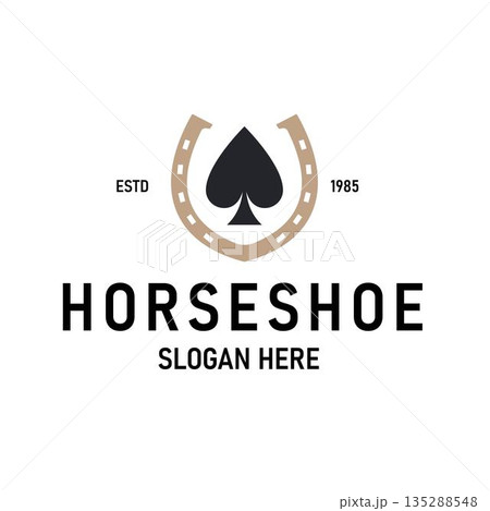 Vintage Logo featuring a Combination of a Golden Horseshoe and a Black Spade Symbol. 135288548