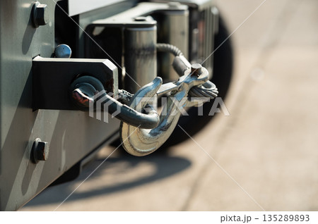 Close up of heavy duty metal winch hook on a vehicle front bumper Close up of heavy duty metal winch hook on a vehicle front bumper 135289893