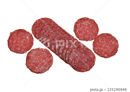 Dry-cured sausage cut into circles. Dry-cured sausage cut into circles. 135290946