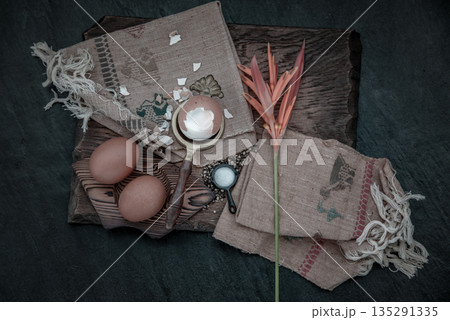 Boiled eggs with salt and pepper on beautiful wooden background, Nutrition concept. Boiled eggs with salt and pepper on beautiful wooden background, Nutrition concept. 135291335