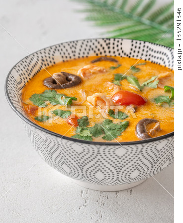 Creamy tom yum soup with shrimp coconut milk and herbs Creamy tom yum soup with shrimp coconut milk and herbs 135291346