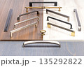 Diverse collection of cabinet handles showcasing elegant designs for home improvement projects 135292822