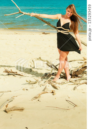 Happy woman outdoor on beach. 135293459