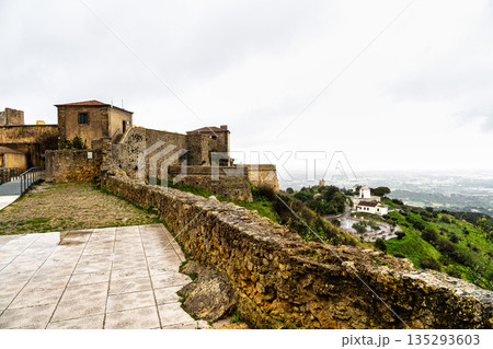 Medieval hilltop castle-fortress Castelo de Palmela in Portugal. Large walls with watchtowers. National Monument in Portugal. 135293603