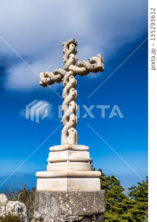 Cruz Alta or High Cross in Sintra, Portugal. It stands at the highest point in the Sintra hills in park of Sintra. Cruz Alta or High Cross in Sintra, Portugal. It stands at the highest point in the Sintra hills in park of Sintra. 135293612