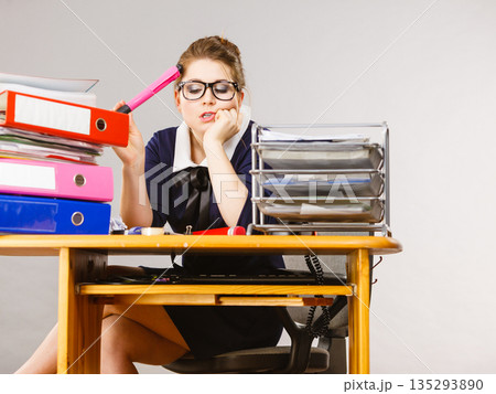 Sleepy business woman in office working 135293890