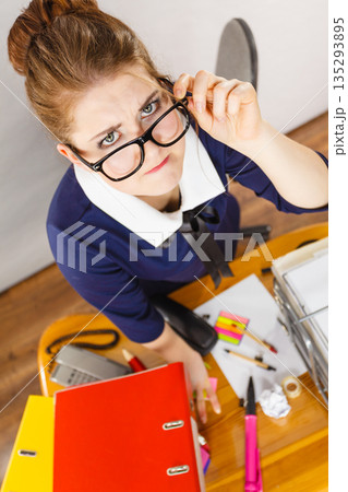 Angry mad bossy businesswoman being furious Angry mad bossy businesswoman being furious 135293895