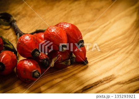 Hawthorn on wooden table background Hawthorn on wooden table background 135293921