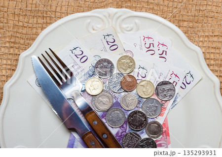 British money on kitchen table, cost of living 135293931