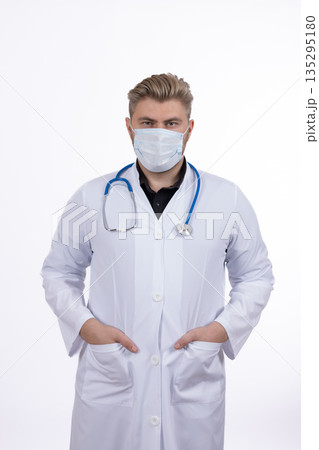Portrait of a male doctor in a protective mask 135295180