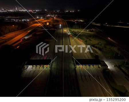 Night hyperlapse of highway toll gates and traffic Night hyperlapse of highway toll gates and traffic 135295200