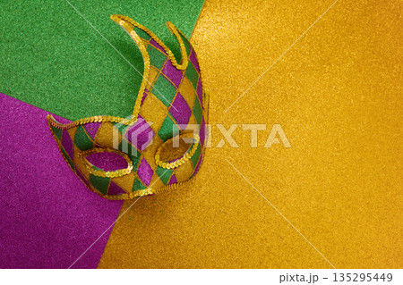 Mardi gras carnival mask on glitter background 135295449