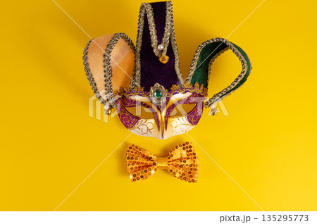 Mardi Gras background. Mardi Gras festive banner. Colorful beautiful masks with space for text. Mardi Gras background. Mardi Gras festive banner. Colorful beautiful masks with space for text. 135295773