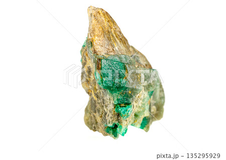 macro stone mineral emerald on a white background macro stone mineral emerald on a white background 135295929