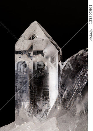 Macro mineral stone rhinestone, rock crystal on a black background 135295961