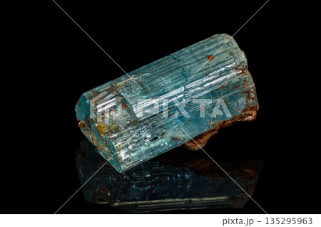 macro mineral stone aquamarine on a black background 135295963
