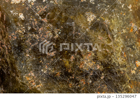 macro mineral stone Andradite on a black background macro mineral stone Andradite on a black background 135296047