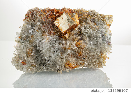 macro mineral stone Quartz Pyrite on a white background macro mineral stone Quartz Pyrite on a white background 135296107