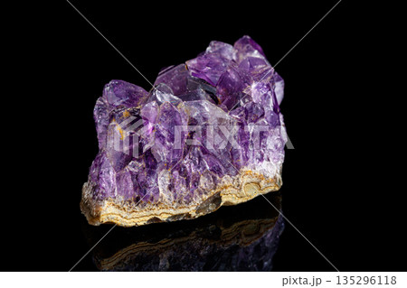 macro mineral stone Amethysts on a black background macro mineral stone Amethysts on a black background 135296118