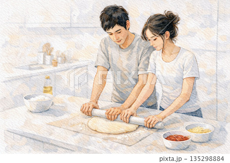 朝のキッチンでピザ生地を一緒に伸ばす日本人カップル 135298884