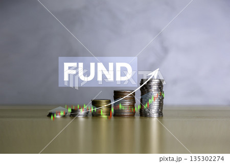 Fund, Save money, dividend and Interest rate concept. symbol and arrow pointing up on gold coins instead Return on Stocks, Funds long-term investment. income return retirement fund at stock market. Fund, Save money, dividend and Interest rate concept. symbol and arrow pointing up on gold coins instead Return on Stocks, Funds long-term investment. income return retirement fund at stock market. 135302274