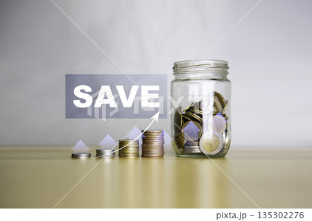 Saving money concept. SAVE icon on gold coins of gold saving money for future and retirement concept. Save stacking coin money for growing your business investment concept. 135302276