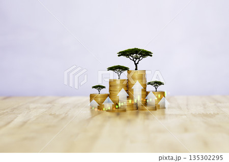 Stacks of coins with trees and upward arrows, symbolizing sustainable financial growth, green investments, and long-term wealth building. Stacks of coins with trees and upward arrows, symbolizing sustainable financial growth, green investments, and long-term wealth building. 135302295